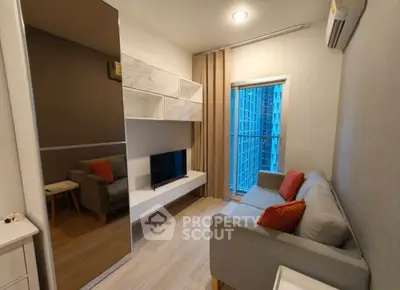 Modern living room with cozy sofa and city view window in stylish apartment.