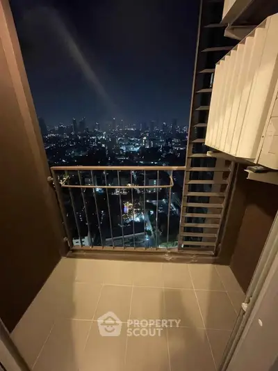 Stunning night cityscape view from a high-rise balcony, perfect for urban living enthusiasts.