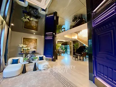 Luxurious modern living room with elegant decor and grand piano, perfect for sophisticated gatherings.