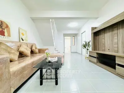 Spacious modern living room with stylish decor and comfortable seating