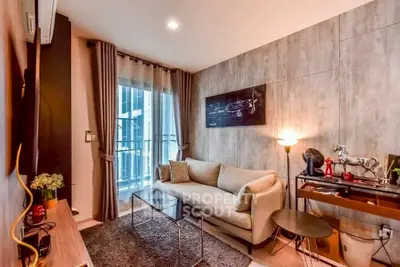 Modern living room with cozy sofa and stylish decor in a high-rise apartment.