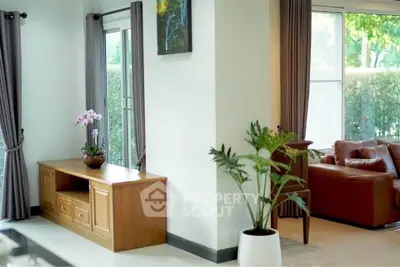 Spacious living room with elegant decor and natural light