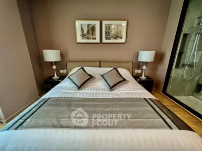 Elegant bedroom with stylish decor and modern lighting in a luxury apartment
