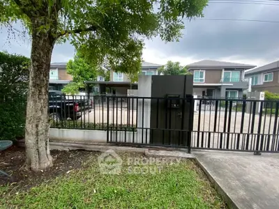 Charming suburban home with modern architecture and lush greenery, perfect for family living.
