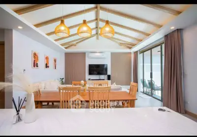 Stunning open-plan living room with modern decor and natural light