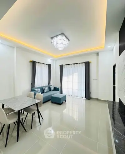 Modern living room with elegant lighting and stylish furniture