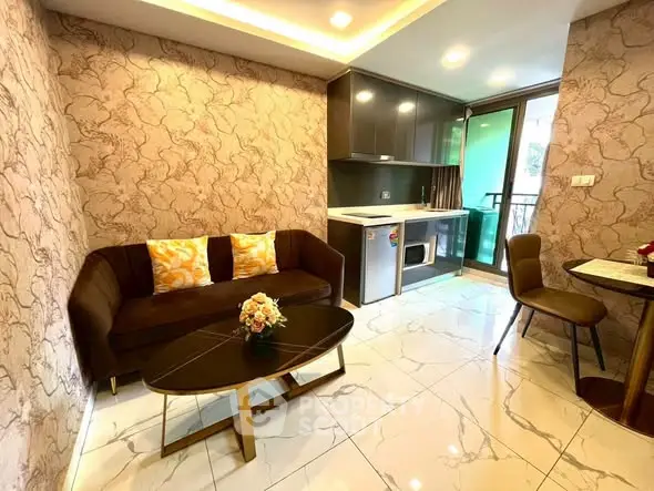 Stylish modern living room with open kitchen and elegant decor