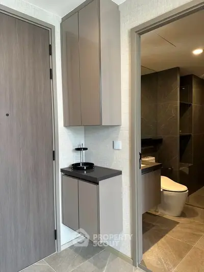 Modern bathroom with sleek cabinetry and contemporary design