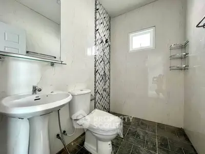 Modern bathroom with sleek fixtures and stylish tile design
