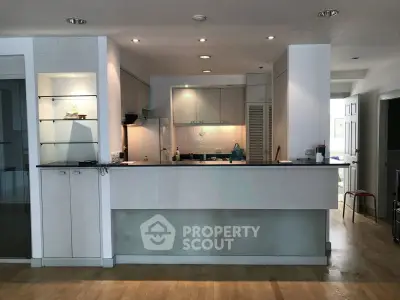 Spacious kitchen with modern design and ample storage space