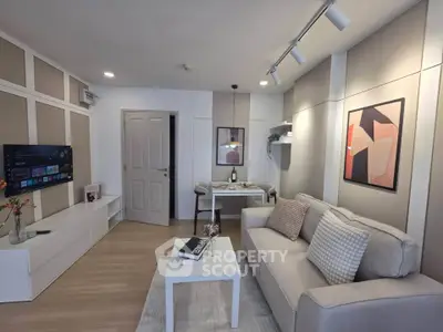 Modern living room with stylish decor and cozy seating area, perfect for relaxation and entertainment.
