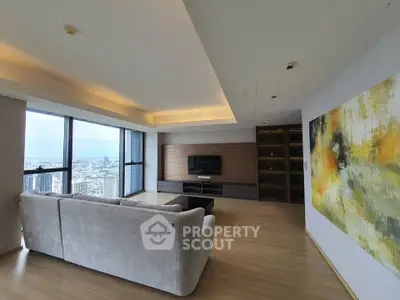 Spacious modern living room with panoramic city view and elegant decor