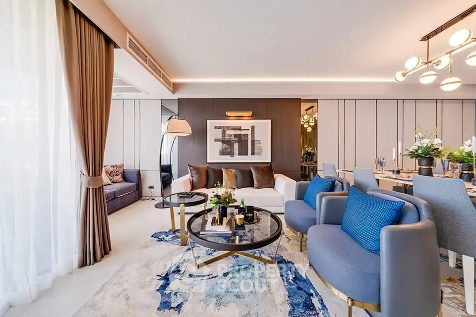 Luxurious modern living room with elegant decor and stylish furniture, featuring a spacious open layout and chic lighting.