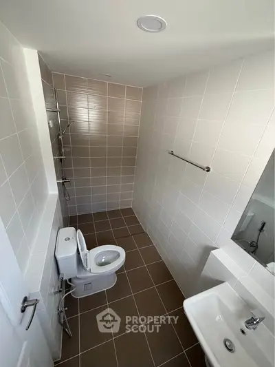 Modern bathroom with sleek tiles and contemporary fixtures