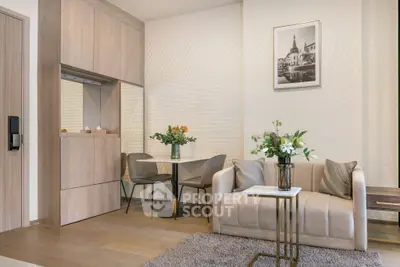 Modern living room with stylish decor and cozy seating area in a contemporary apartment.