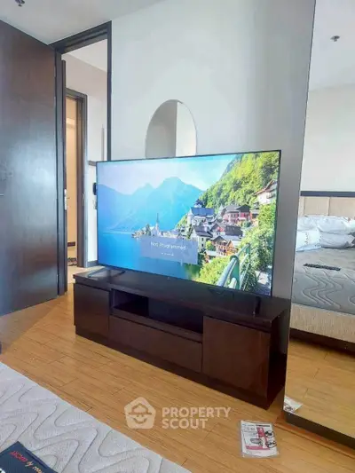 Modern living room with sleek TV stand and cozy decor