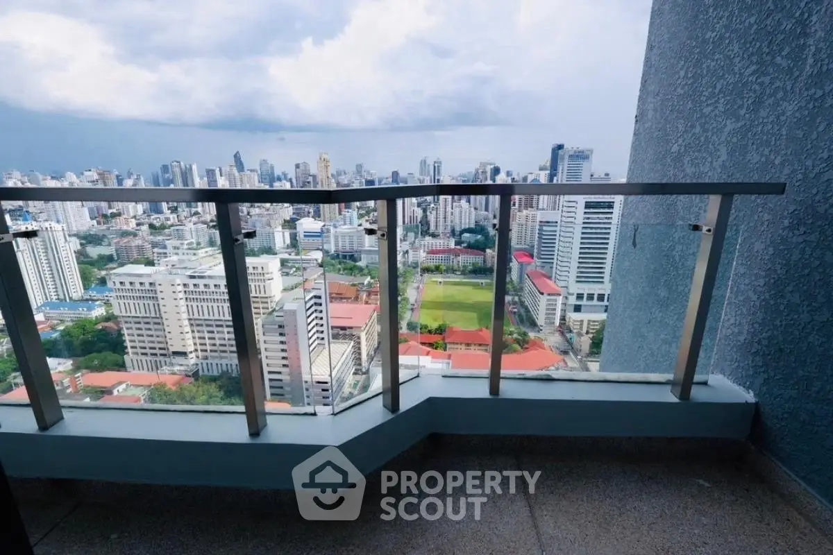 Stunning cityscape view from a high-rise balcony, perfect for urban living enthusiasts.
