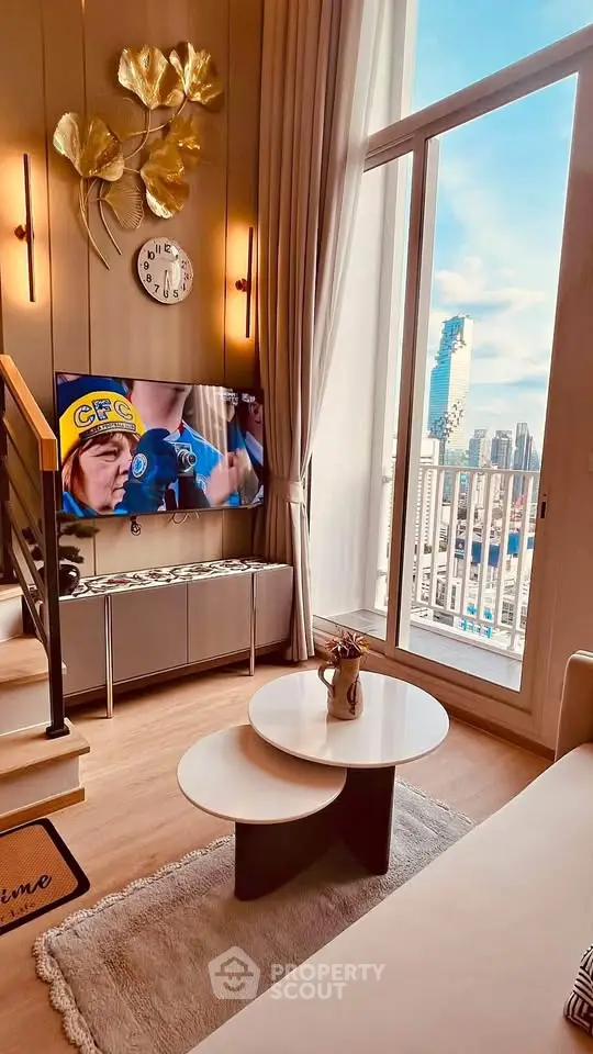 Luxurious living room with high ceilings and stunning city view from balcony.