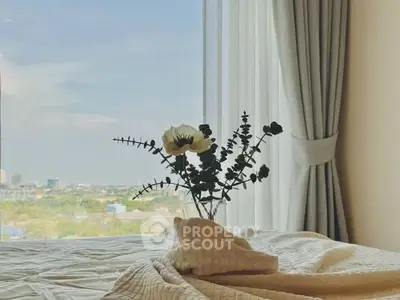 Cozy bedroom with elegant decor and scenic window view