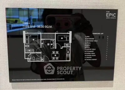 Modern apartment floor plan with furniture layout at Pure Epic Condo.