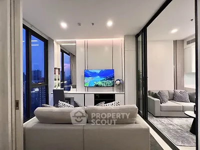 Modern living room with stunning city view and elegant decor