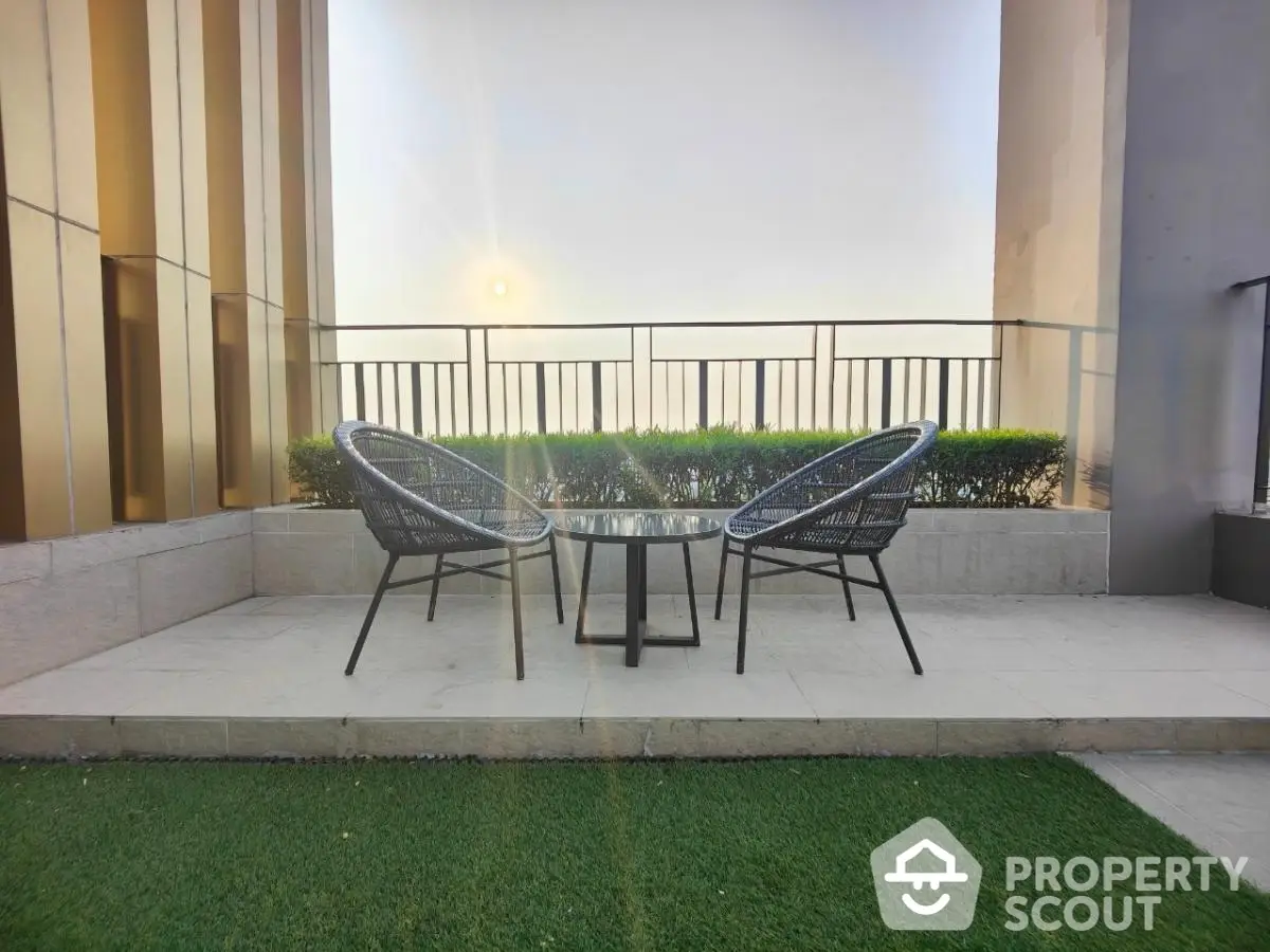 Elegant rooftop terrace with stylish seating and lush greenery, perfect for relaxation and city views.