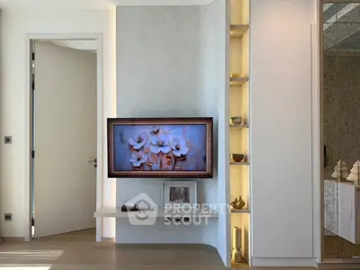 Modern living room with elegant wall art and stylish shelving