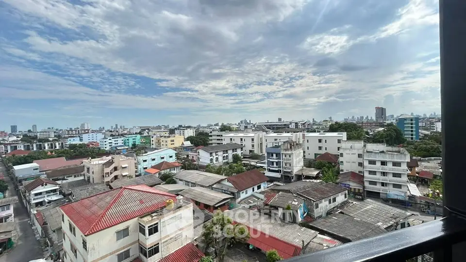Stunning cityscape view from a high-rise balcony showcasing urban living with expansive skyline.