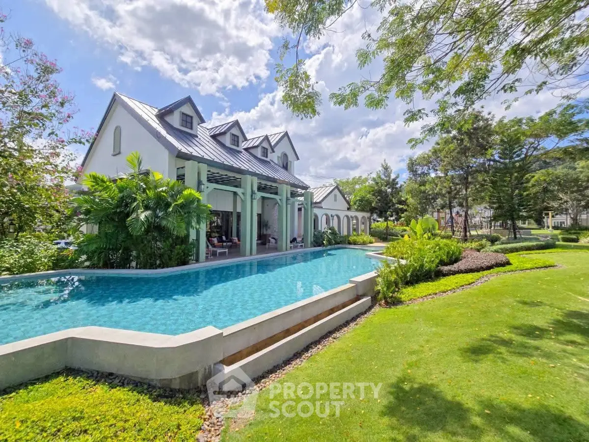 Luxurious estate with stunning pool and lush garden, perfect for serene living.