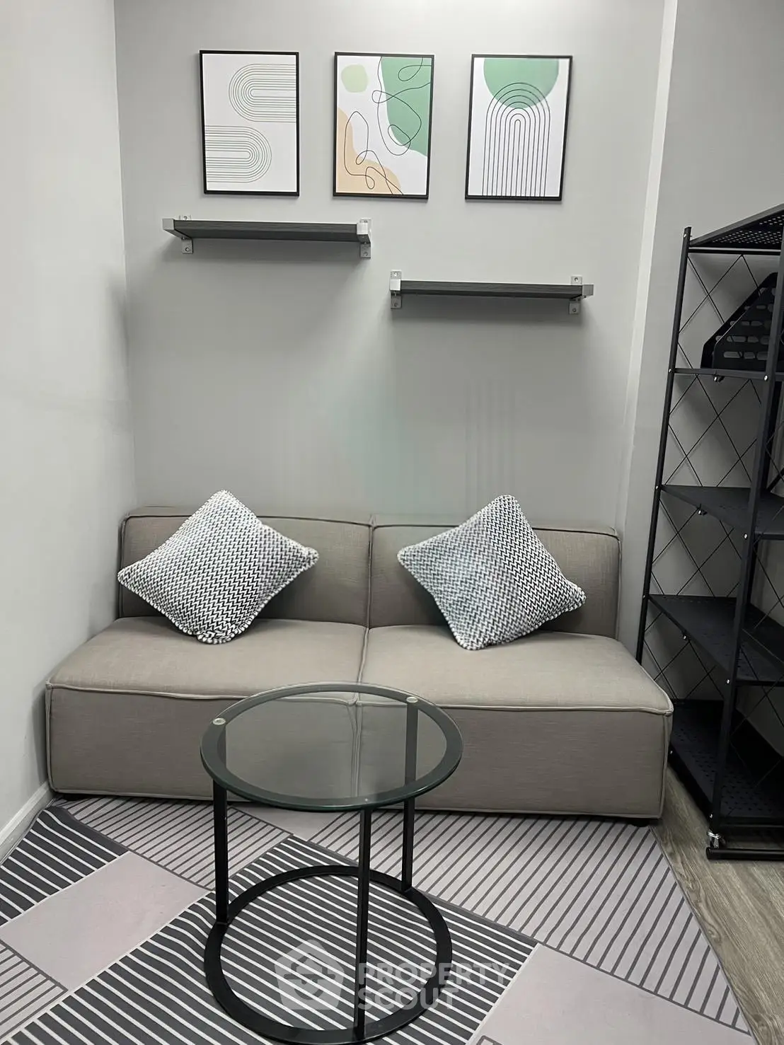 Modern small living room with stylish decor and cozy seating area