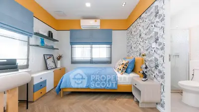 Modern bedroom with stylish decor and vibrant colors