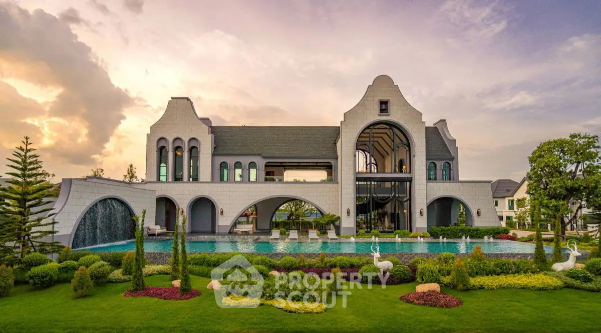 Luxurious mansion with stunning architecture and lush garden, featuring a grand pool and elegant design.