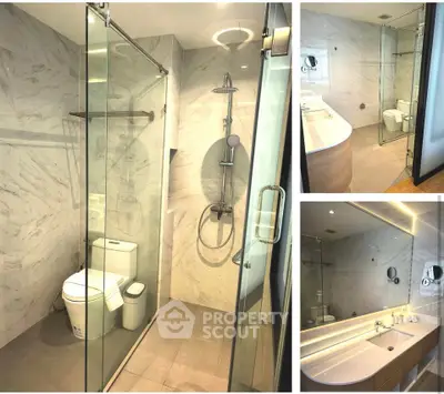 Luxurious modern bathroom with glass shower and elegant fixtures