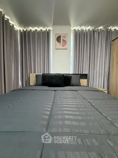 Modern bedroom with stylish decor and cozy ambiance