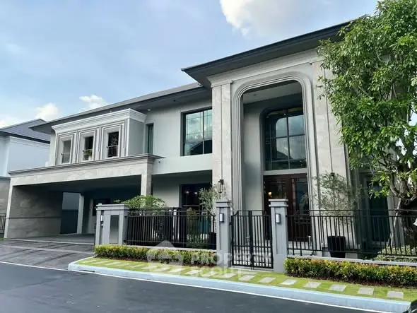 Luxurious modern house with elegant facade and spacious driveway