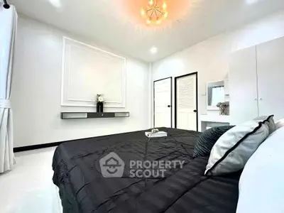 Luxurious bedroom with elegant decor and modern lighting