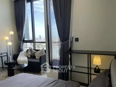 Modern bedroom with stunning city view and elegant decor