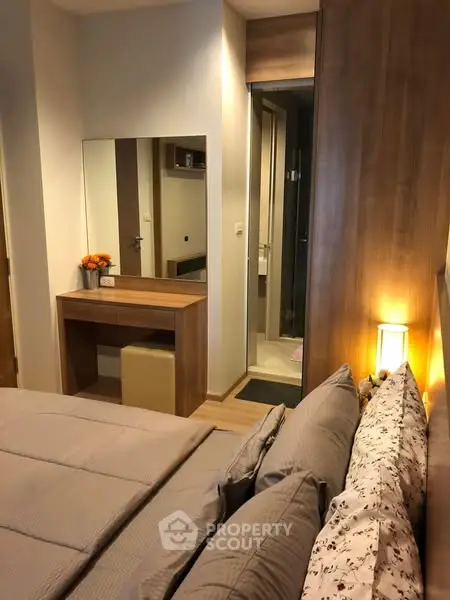 Cozy bedroom with modern decor and ensuite bathroom