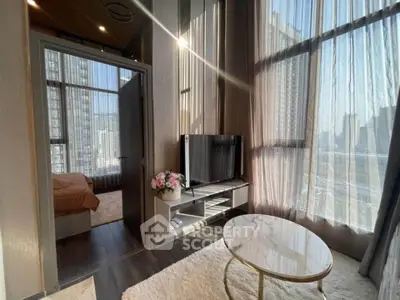 Modern living room with floor-to-ceiling windows and city view