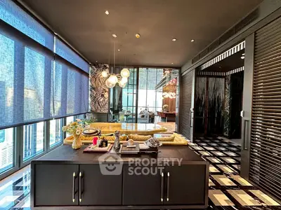 Luxurious modern living room with elegant decor and stunning city view.