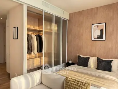 Modern bedroom with sliding wardrobe doors and stylish decor