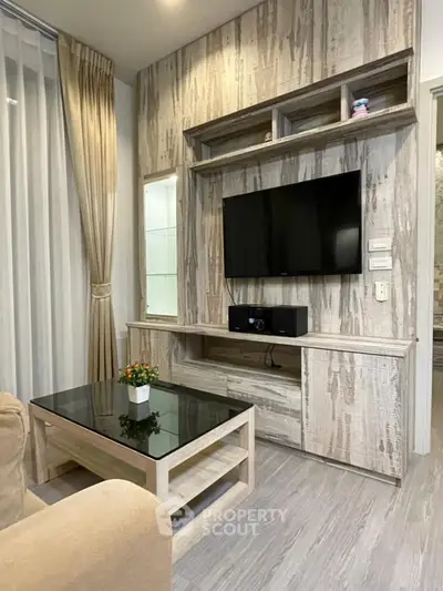 Modern living room with stylish TV unit and cozy decor
