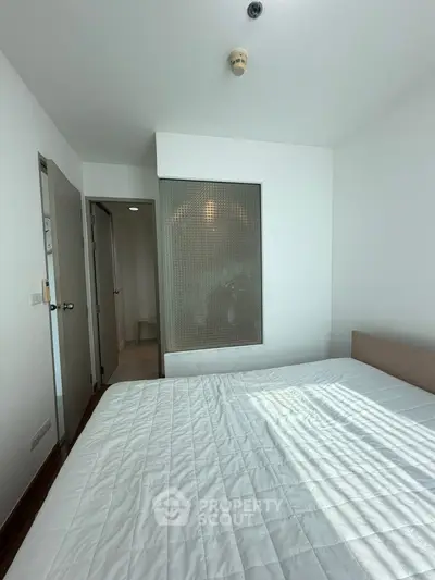 Bright bedroom with modern design and natural light