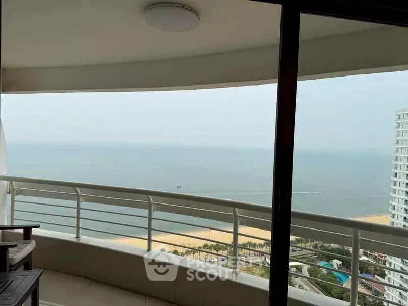 Stunning ocean view from a high-rise balcony, perfect for relaxation.
