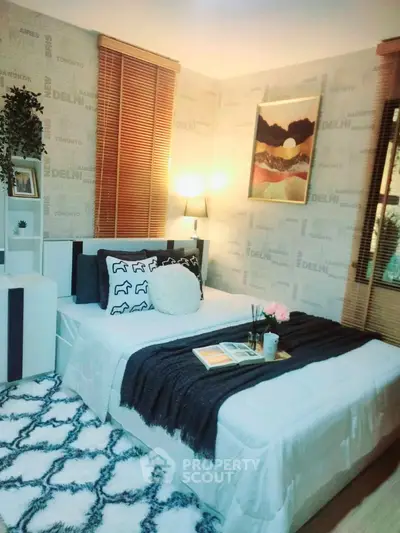 Cozy bedroom oasis with stylish decor, warm lighting, and chic furnishings, perfect for relaxation and comfort in a modern home.