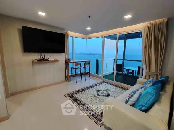 Spacious living room with stunning ocean view and modern decor