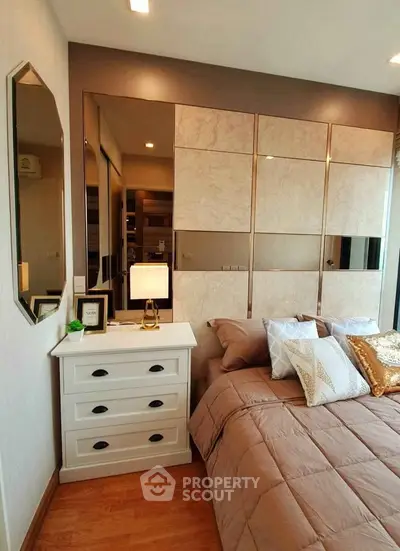 Luxurious bedroom with elegant decor and ample storage space