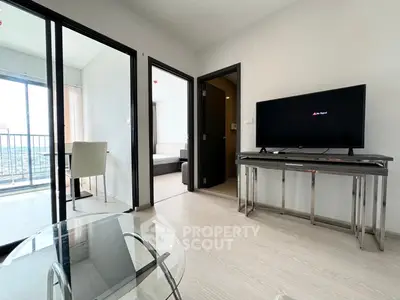 Modern apartment living room with balcony and sleek furniture