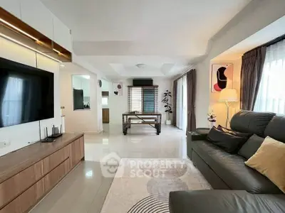 Spacious modern living room with sleek furniture and stylish decor