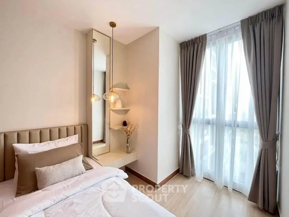 Elegant bedroom with natural light and modern decor